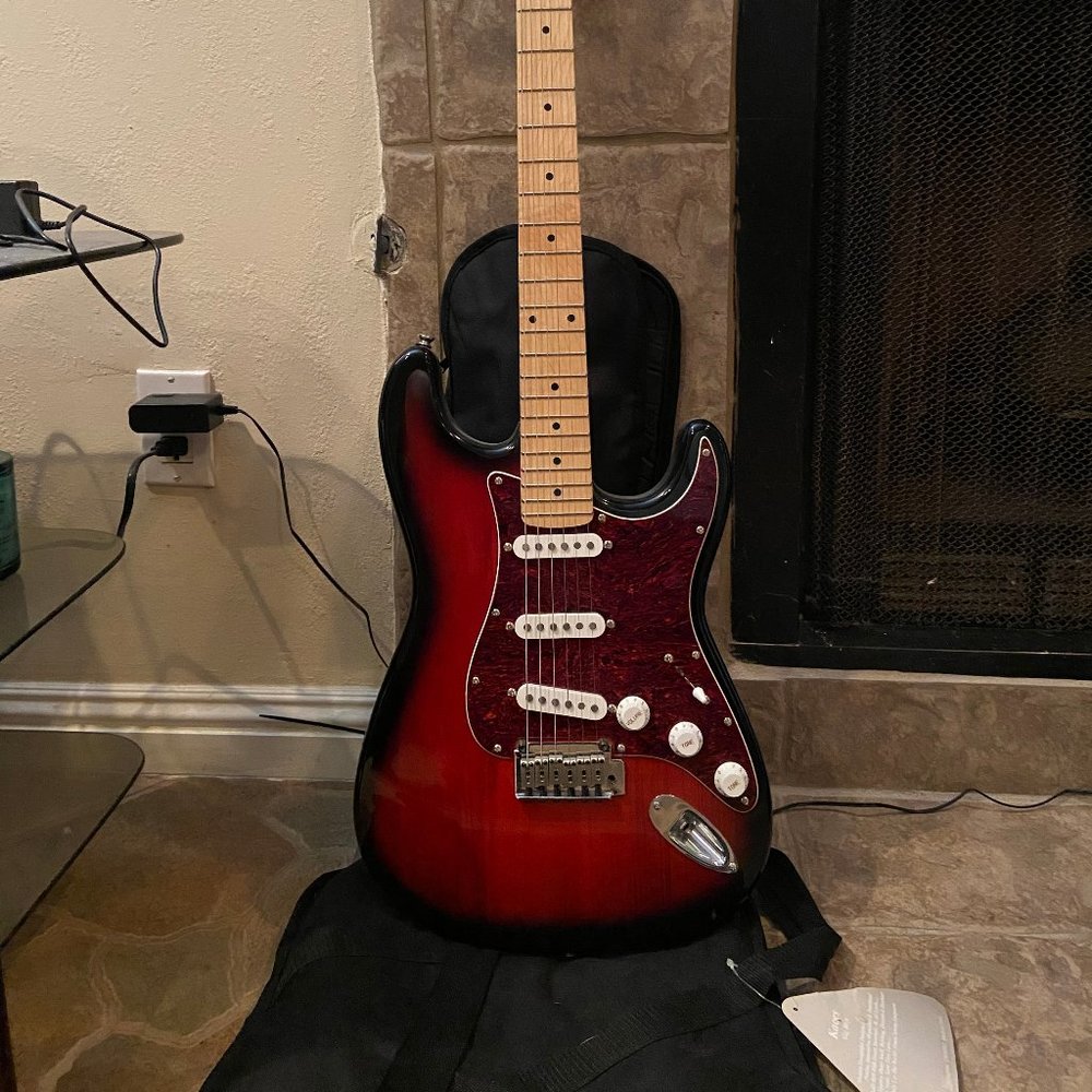 Fender Squier Stratocaster Electric Guitar and Amp